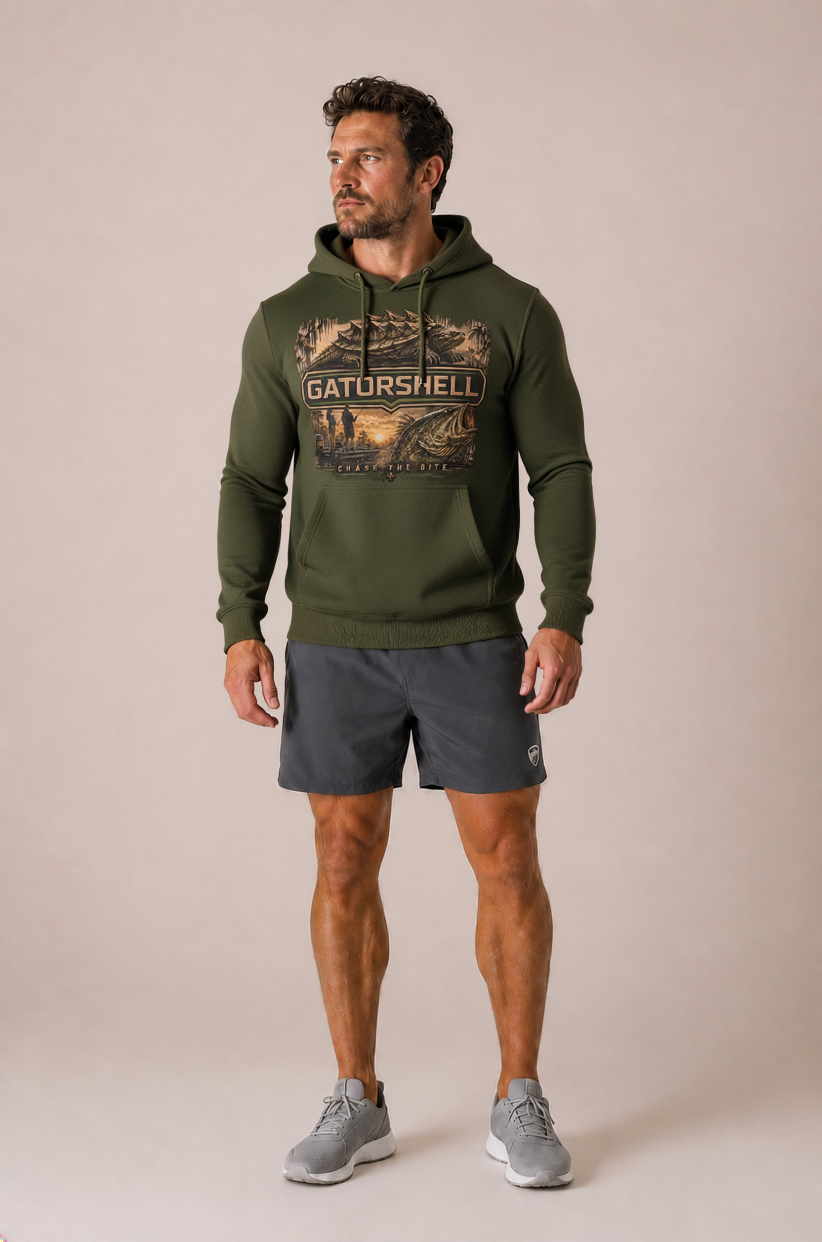 Male model wearing the GatorShell bass fishing hoodie in Military Green.