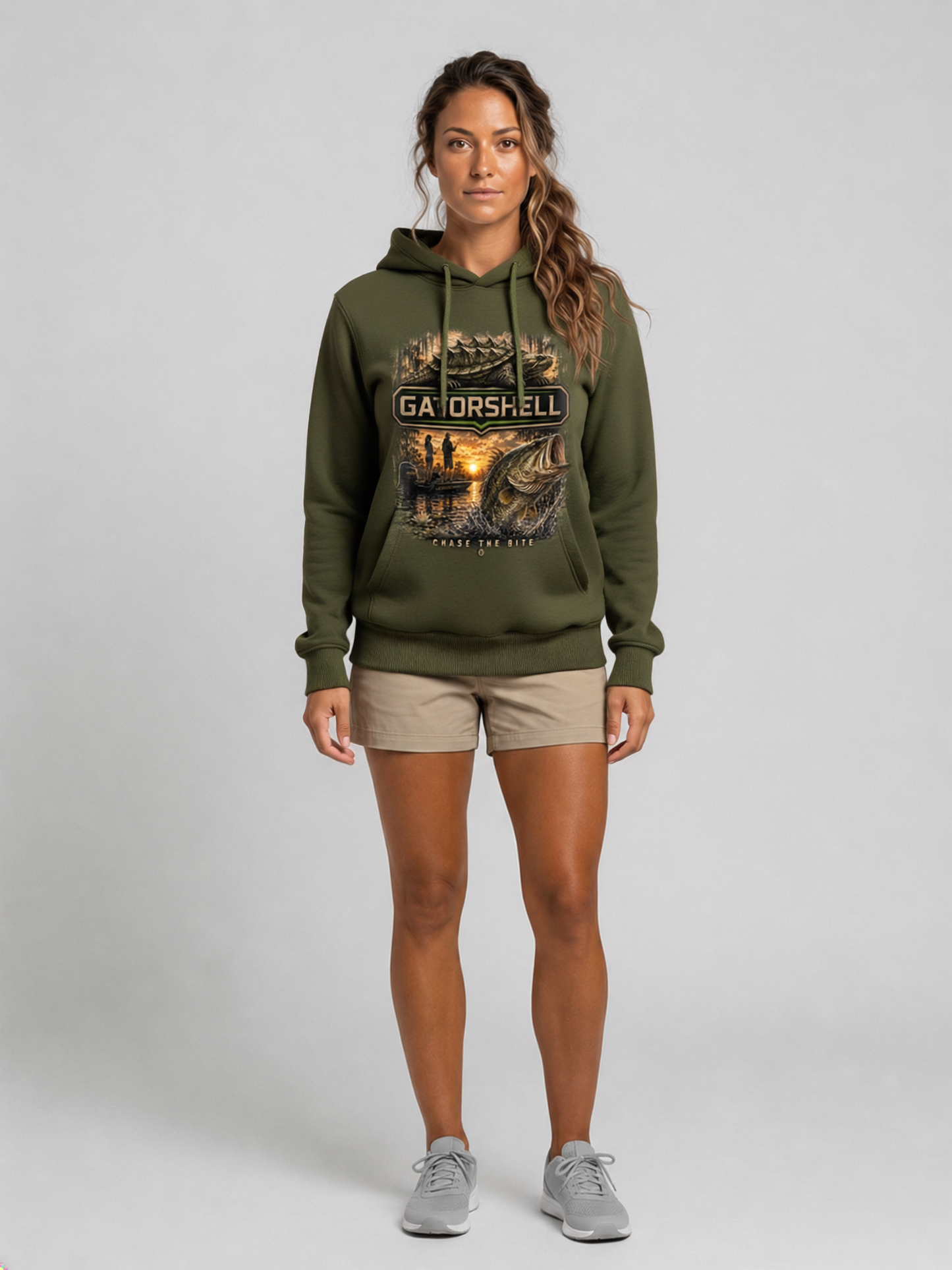 Female model wearing the GatorShell bass fishing hoodie in Military Green.