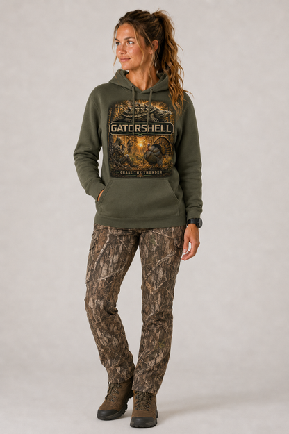 Female model wearing military green GatorShell Turkey Hunting hoodie